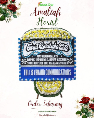 Papan Bunga Duka di Simpang